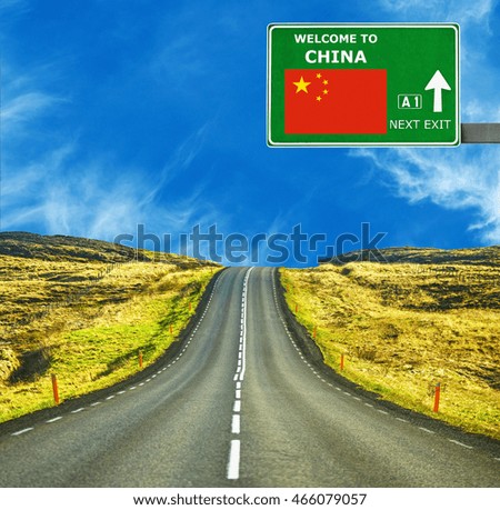 China road sign against clear blue sky
