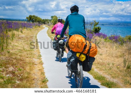 Touring bicycle riding in New Zealand. Taupo lake. Royalty-Free Stock Photo #466168181