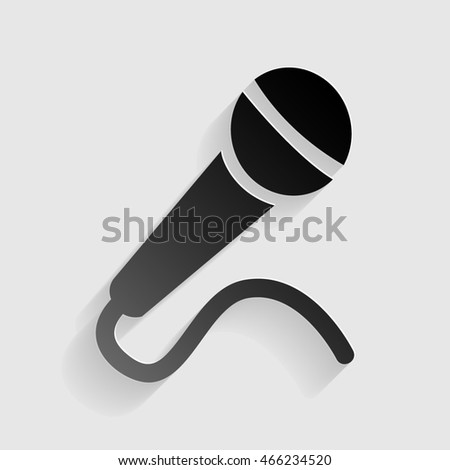 Microphone sign illustration. Black paper with shadow on gray background.