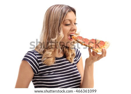 Studio shot of a young woman eating a slice of pizza isolated on white background 