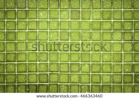 Green mosaic wall texture and background