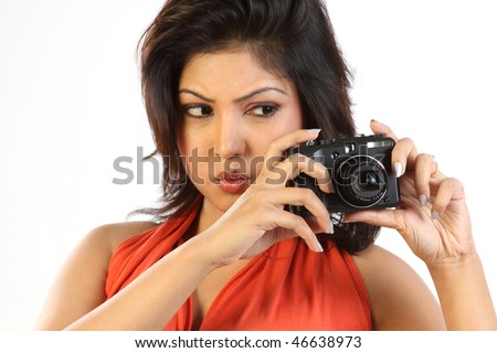 Woman shooting with digital camera