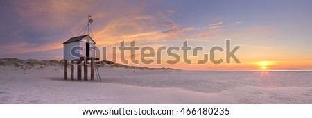 Refuge hut on the beach of the island of Terschelling in The Netherlands. Photographed at sunset.