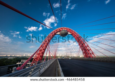 Picturesque bridge - arch, steel cable-stayed bridge across the Moscow river, is located in the West of Moscow Royalty-Free Stock Photo #466485458