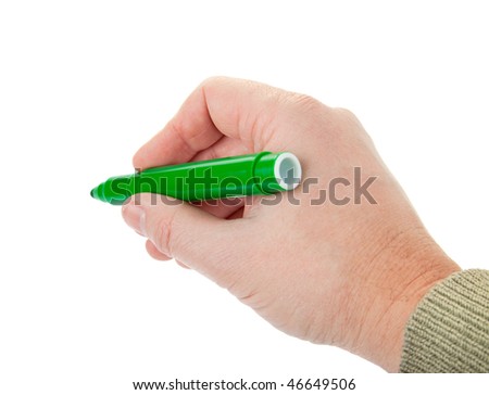 man's hand holding a green felt-tip on white