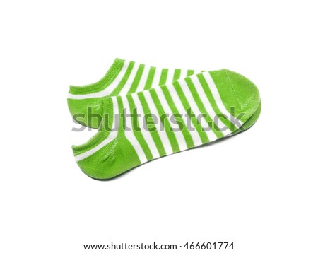 Child's striped socks, green sock for backgrounds or textures.