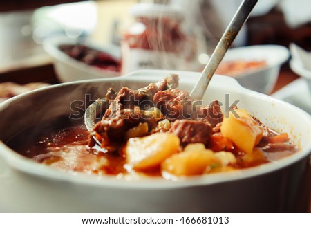 â??goulash,â?� this popular soup is a Hungarian original soup. Budapest, Hungary.  Royalty-Free Stock Photo #466681013