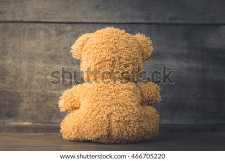 Teddy bear sitting, turned on wood, Vintage Tone