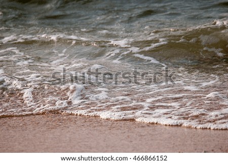 Sea wave and beach vintage toned instagram retro color look.