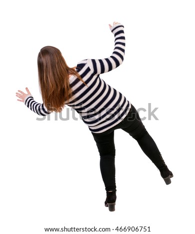 Balancing young woman.  or dodge falling woman. Rear view people collection.  backside view of person.  Isolated over white background. Girl in a striped jacket falls balancing on his left leg.