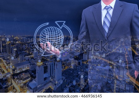 double exposure of businessman holding globe network concept 
