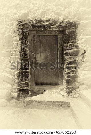 Ancient door at Thiksey Gompa - Tibet, Kargil District, Leh district, Western Ladakh, Himalayas, Jammu and Kashmir, Northern India (stylized retro)