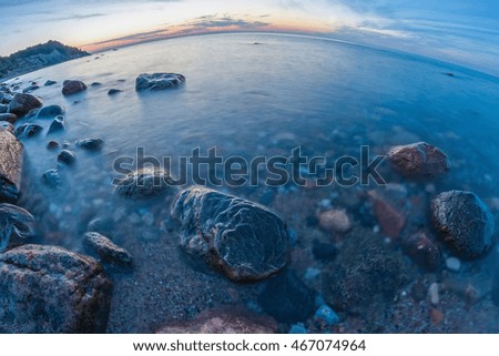 Long exposure picture of tranquil sunset at the Baltic seashore