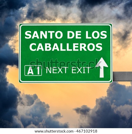 SANTO DE LOS CABALLEROSroad sign against clear blue sky