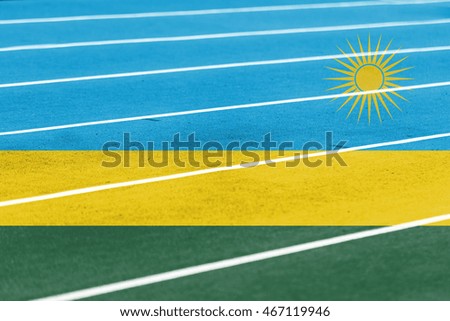 running athletic race track with blending  Rwanda flag