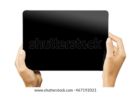 Female hands holding horizontal white tablet with black screen isolated at white background.