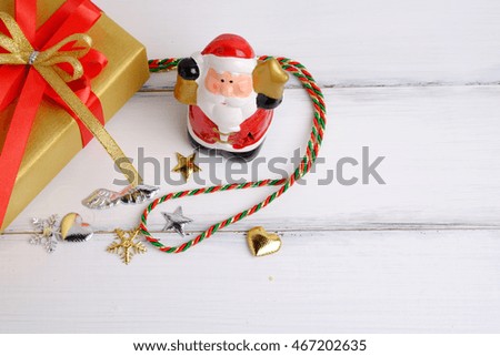 Merry christmas design on white wood with decoration accessories background, close up.