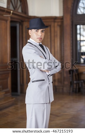 Tango Dancer With Arms Crossed At Restaurant