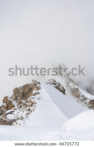top of the ridge in the fog