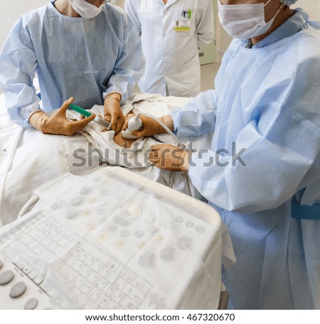 surgery, surgeons make an injection and ultrasound