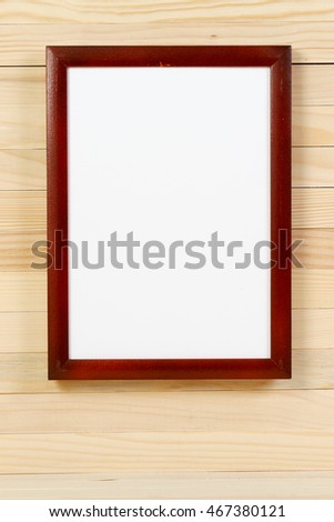 Frame on wooden wall. Interior Design. Copy space.