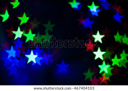 colorful bokeh shapes of a five pointed star