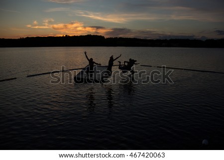 jumping off dock at sunset