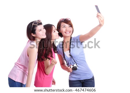 Happy teenagers woman taking pictures by themselves isolated on white background, asian