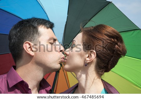 Beautiful couple outdoors in a summer day