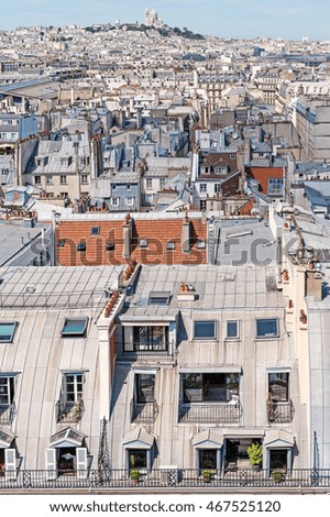 Beautiful roofs of Paris. In the background of the Basilica Sacre Coeur.