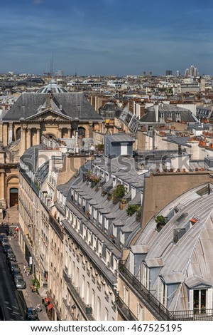 Beautiful roofs of Paris. In the background of the Basilica Sacre Coeur.