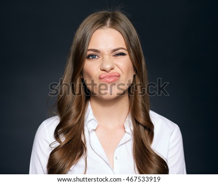 Face look in awkward situation of young woman. Funny face.