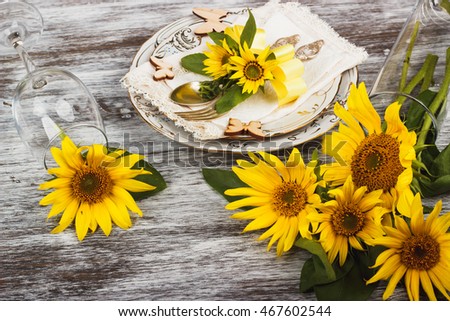Tableware and silverware with on the wooden background