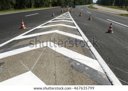 painted road markings on the road