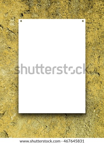 Close-up of one nailed blank frame on yellow concrete wall background