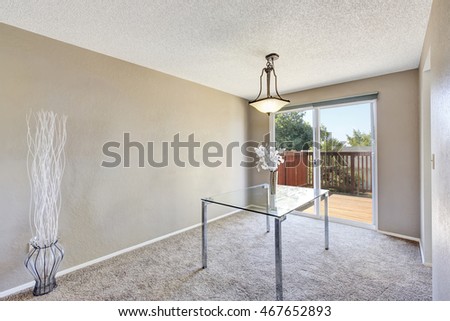 Elegant bright dining area with glass table and nice decor. Exit to the balcony. Northwest, USA
