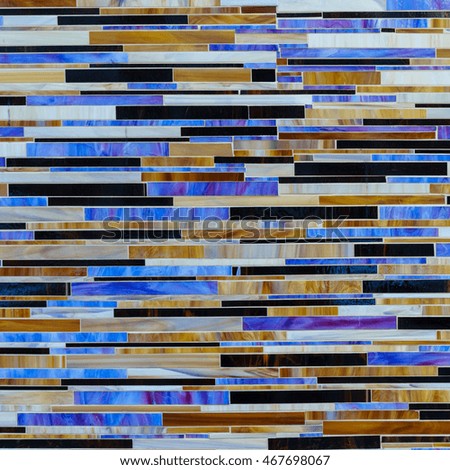 wall and floor mosaic tiles in blue and brown tone.