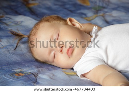 Little newborn baby girl sleeping