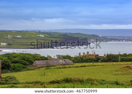View of village and beach nearby Giant's Causeway, the landmark in Northern Ireland.