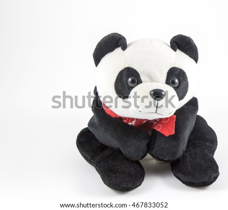 Panda bear with a red scarf on white background / Soft Toy Panda on White Background.