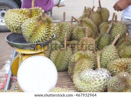 Group of Thai fruit Durian in the market with scales