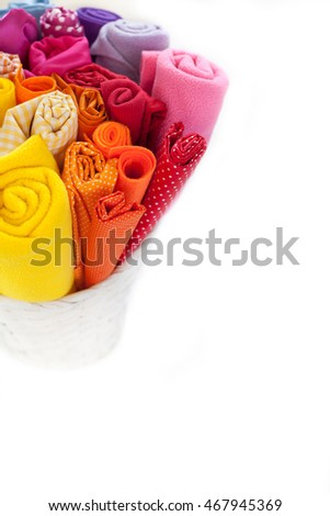 Rolls of colored fabric on a white background. White background. 