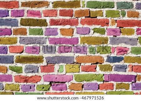 Colorful old brick wall in Finland. The colors are made using image editing software.