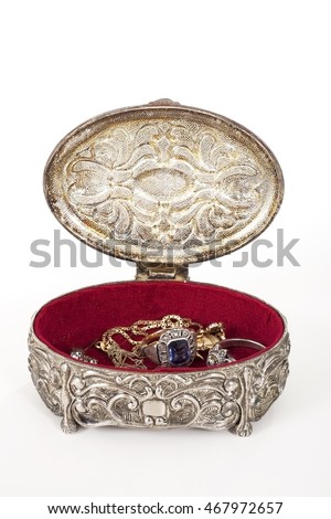 Casket on white background. Jewelry box. Jewelery case. Jewellery symbol. Jewells in box. Jewelerys in red carpet. Jewellerys on red carpet chest. Diamond gold sapphire ring in jewel box. Real old.