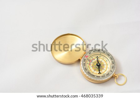 A High Quality Brass Compass isolated on white. Clipping path present on maximum resolution downloads