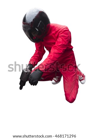 Pit stop technician maintaining service for a racing car during competition event isolated on white background with clipping path

