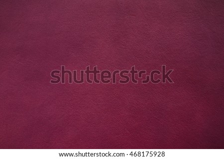 Real leather color Burgundy texture made from cow skin Royalty-Free Stock Photo #468175928