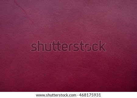 Real leather color Burgundy texture made from cow skin Royalty-Free Stock Photo #468175931