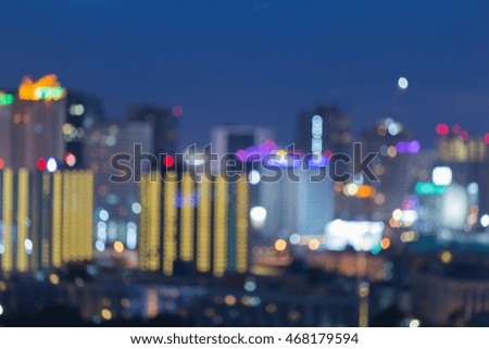 Twilight night view, abstract blurred city downtown background