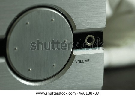 Round dial volume button style represent the radio technology concept related idea.